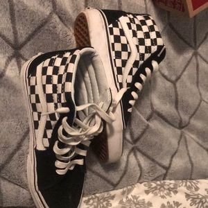 Black and white high top checkered vans TRADES